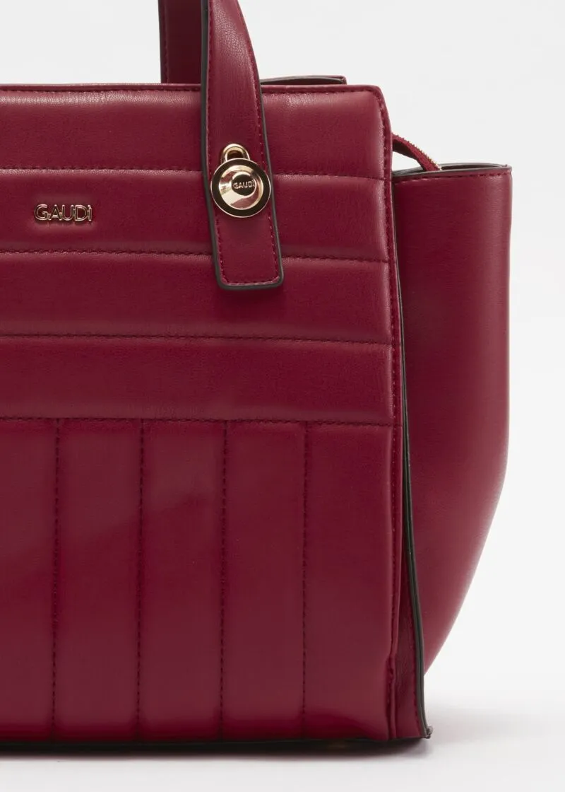 Borsa in ecopelle con borchie