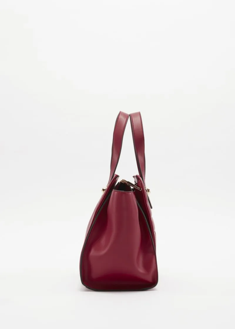 Borsa in ecopelle con borchie