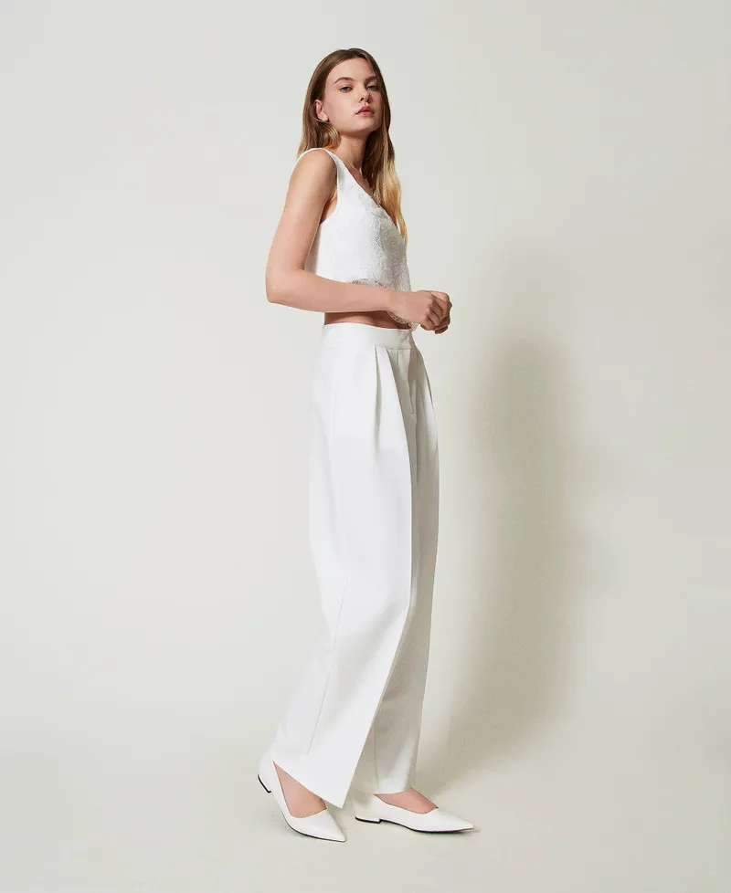 Pantaloni a palazzo con pieghe