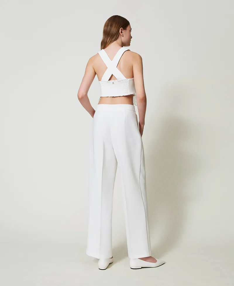Pantaloni a palazzo con pieghe