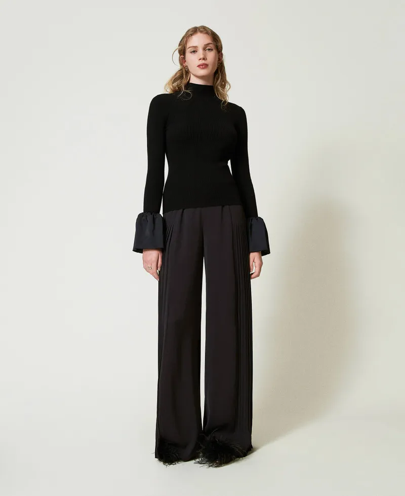 Pantaloni a palazzo in georgette plissé