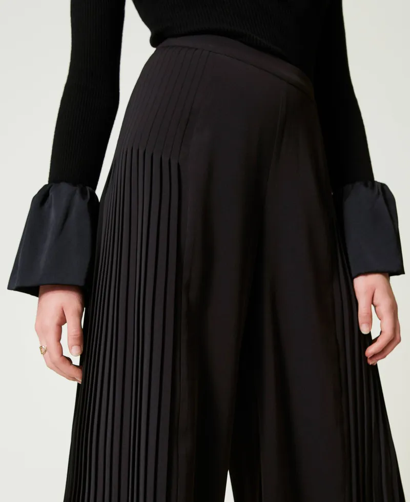 Pantaloni a palazzo in georgette plissé